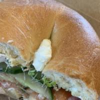 Lox Bagel · Smoked salmon, cream cheese, capers, red onion, cucumber and sprouts on a plain bagel. Comes...