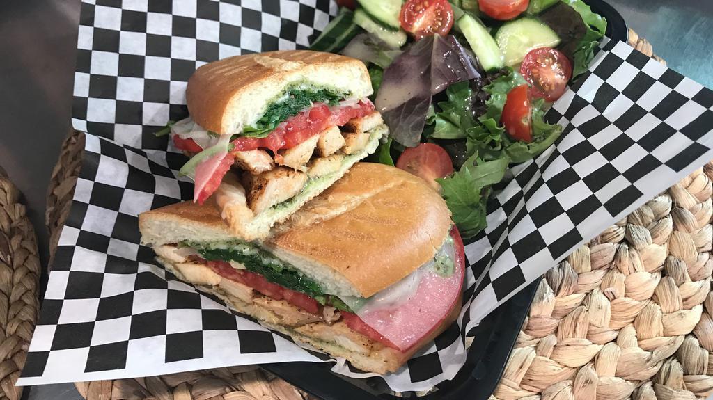 Grilled Chicken Panini · Served with onions, tomatoes, provolone, spinach, pesto or chipotle aioli.