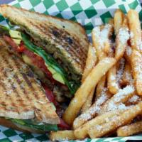 Veggie Panini · Served with provolone, spinach, roasted bell peppers, grilled onions, grilled zucchini, avoc...