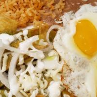 Chilaquiles · Deep fried tortilla chips smothered in either enchilada sauce (salsa roja) or green tomatill...