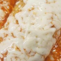 Burrito Mojado - Wet Burrito · Wrapped flour tortilla filled with meat, beans, rice, onions cilantro and hot sauce covered ...
