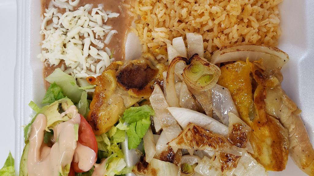 Pollo Asado (Grilled Chicken) · Grilled chicken served with 3 sides and tortillas