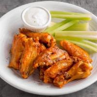Buffalo Style Chicken Wings · Juicy oven baked chicken wings ()sever with Ranch every 6 wings get one ranch.