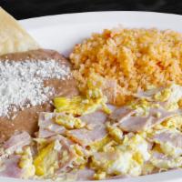 Huevos Con Jamon · Ham and Eggs served with rice and beans