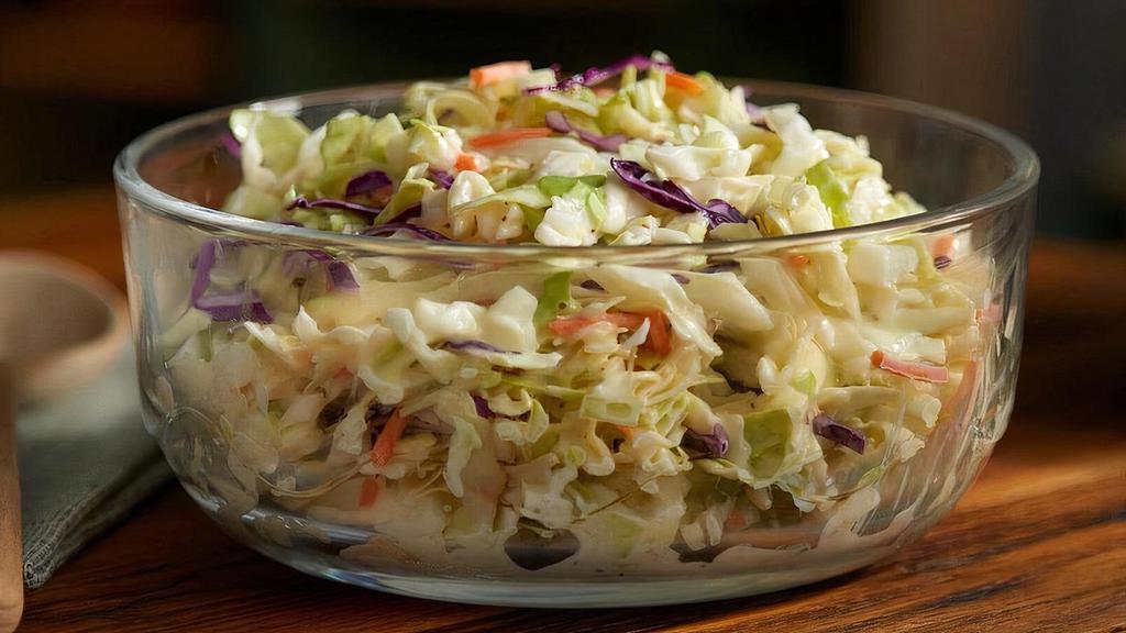 Cole Slaw (Large) · A mix of green cabbage, red cabbage and carrots tossed in a Coleslaw dressing. .