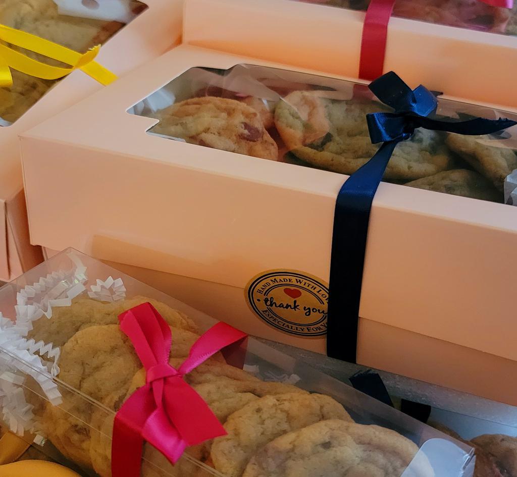 Gold Cookie Box · This one dozen treat box includes 12 delicious soft baked cookies that can definitely aim to please. All boxes are wrapped like a gift so you can either treat yourself or gift someone else.