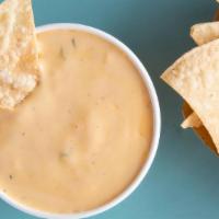 Big Queso · big queso. served with chips