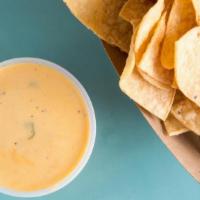 Lil' Queso · served with chips