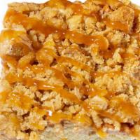 Apple Caramel Cheesecake · You want crisp apple pie. You want gooey caramel. You want creamy cheesecake poured over a s...