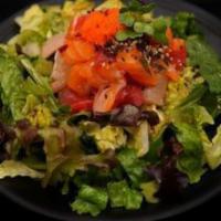 Sashimi Salad · Salmon, tuna, white fish, masago, spring mix salad, special dressing, black sesame seeds.