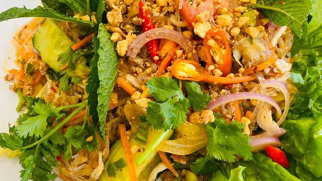 Yum Woon Sen · Glass noodle salad, ground pork, imitation crab meat,  cucumbers, tomatoes, carrots, onions, crushed peanut tossed in sweet and spicy sauce