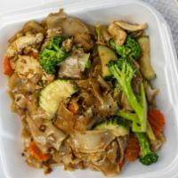Pad Si Ew · Pan fried wide rice noodles, broccoli, carrots, and zucchini with homemade sweet sauce. Plea...