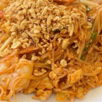 Pad Thai · Pan fried rice noodles, bean sprouts, green onions, Tamarind sauce served with crushed peanu...