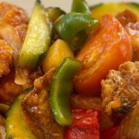 Sweet & Sour Fish · Battered talapia, cucumbers, tomatoes, onions, pineapple, and bell peppers. Steam or Sticky ...