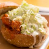 Buffalo Chicken · Natural homemade fried chicken, buffalo sauce, blue cheese slaw.