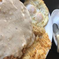 Chicken Friend Steak Breakfast Sandwich · Sunny egg, chicken fried steak on top of biscuit & homemade gray
