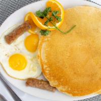 Hot Cake Sandwich · 2 hotcakes, 2 eggs & 2 links sausage or 2 applewood bacon
