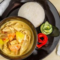 Yellow Curry · Yellow curry, coconut milk, onion, potatoes and carrots. Served with rice.