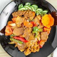 Drunken Noodle · Thick rice noodle stir-fried with tomatoes, bell peppers, onions, carrots, Thai basil, chili...