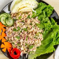 Chicken Salad-Larb · Minced Chicken with red onions, Chili, fresh mint leaves, green onion, lime juice and a touc...