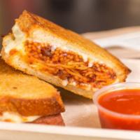 Spaghetti Grilled Cheese · Meat sauce, mozzarella, sourdough bread.
**No substitutions can be made for this item**