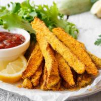 Breaded Zucchini (8 Oz.) · Lightly Breaded fried Zucchini Sticks. Served with ranch dressing.