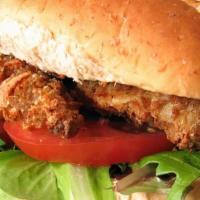 Chicken Sandwich · With mustard and mayo, breaded chicken fillets with lettuce, tomatoes, onions, pickles, and ...