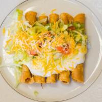Five Rolled Tacos · Comes with guacamole, sour cream, lettuce, pico de gallo and cheese