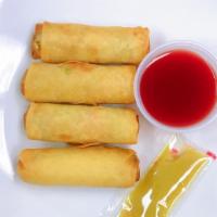 Egg Rolls · Delicious egg rolls with chicken, cabbage, carrots, mushrooms and seasoning.