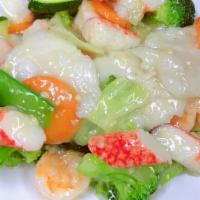 Seafood Delight · Shrimp, fish, scallops, imitation crab meat, and vegetables in a lightly white sauce.