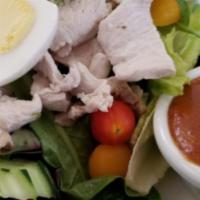 Yum Yai Salad · Organic mixed greens, steamed chicken, organic egg, peanut dressing. Gluten-free.