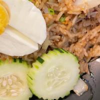 Old-Fashioned Fried Rice · Sweet sausage fried-rice, onion, organic egg, topped with a house-made salted organic egg.