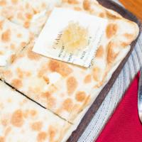 Focaccia Di Recco · Ligurian flatbread, soft cow’s cheese, honeycomb. V