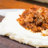 Polenta & Ragu · Mascarpone polenta, ragu of the day.