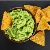 Guacamole & Chips · Fresh guacamole made from locally grown avocados and served with warm and crispy tortilla ch...