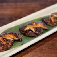 Baked Shiitake Mushrooms · Baked shiitake mushrooms drizzled with special soy sauce.