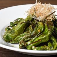 Shishito Peppers · Japanese peppers sauteed with soy sauce topped with bonito flakes