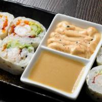 Kenny'S Lobster Roll · Fresh Maine lobster rolled in soy paper, avocado, cucumber and tobiko.  Served with spicy ma...