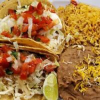 Grilled Fish Tacos (2) · 2 corn tortillas. served with cabbage fish sauce and pico de gallo.