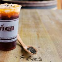 Thai Tea · Thai tea made of raw spices steeped using traditional brewing methods, added milk completes ...