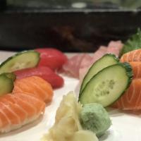 Sushi Bento · Six pieces of assorted sashimi and six pieces of nigiri.