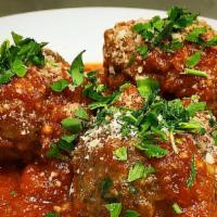 Meatballs · 3 house-made meatballs in a cast iron skillet served with marinara, parmesan, italian parsle...