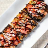 Bruschetta · Fresh oven toasted bread topped with Roma tomatoes, basil, garlic, olive oil, balsamic vineg...