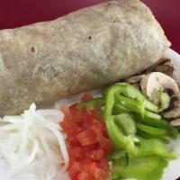 Vegetarian Egg Burrito · Come with eggs, hash brown, chop onion, tomato, bell pepper, mushroom and Cheddar Cheeses  (...