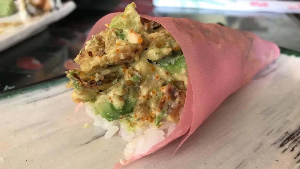 Zig Zag Handroll · Soft shell crab, avocado & masago mixed with house sauce in soy wrap.