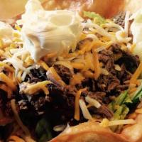 Taco Salad · One choice of carne asada, grilled chicken, shredded chicken or beef with cheese, beans, let...