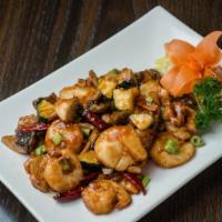 Kung Pao (Lunch) · Choice of meat sautéed with mushrooms, squash, and peanuts in a kung pao sauce.  Served with...