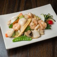 Double Happiness (Gluten Free) · Select scallops and shrimp sauteed with broccoli, mushrooms, snow peas, and carrots in a gar...