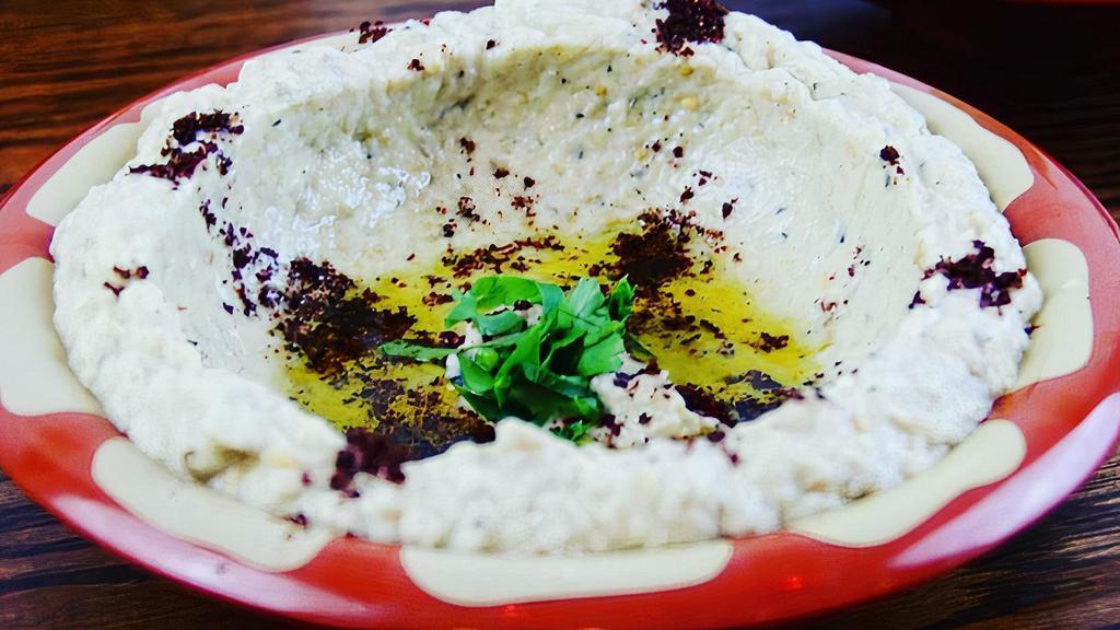 Baba Ghannouj · Vegan, gluten free. Baba Ghannouj  is served with pita bread, olive oil.