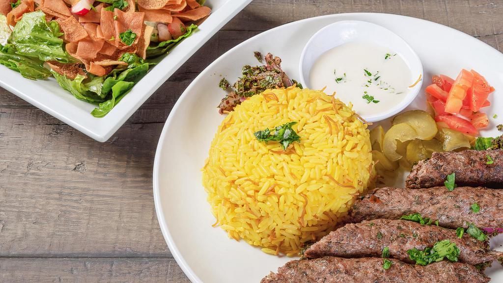 Beef Kafta · Beef Kafta is served with onion parsley mix, tomatoes. Add salad for an additional charge.